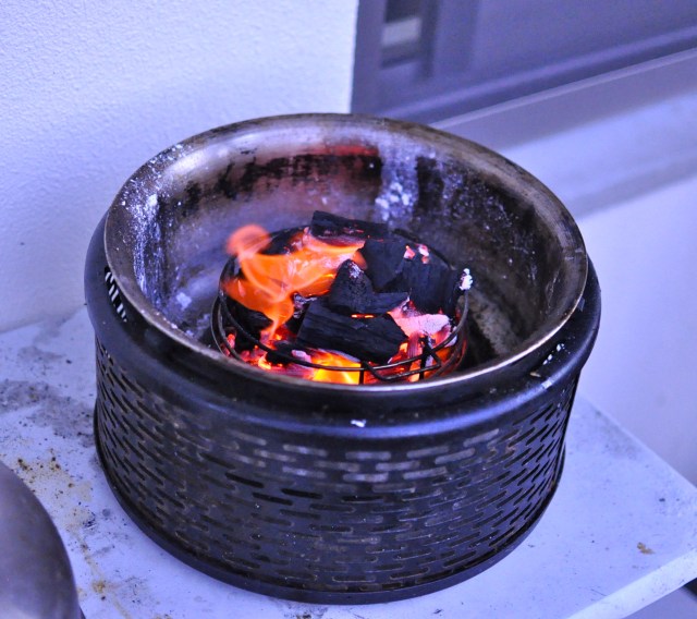 Living by the sea with its inherent windiness is good for getting charcoal hot