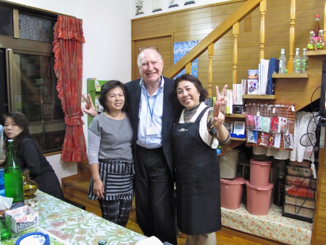 Miyazato san and Noda san in their front room that doubles as a restaurant. The big plastic pails are full of pickles.