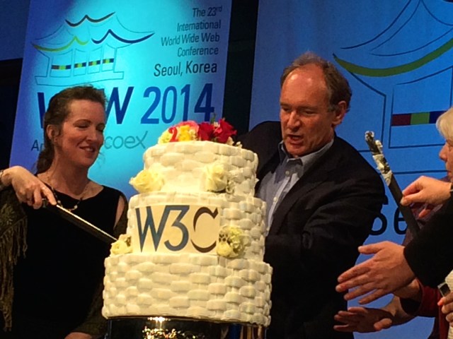 Tim cuts 25th birthday cake.