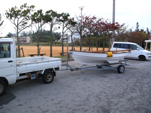 We wait outside the gates, being very quiet.  It has just got light.