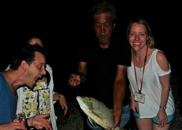 Rowan about to eat fish. Valerie is from Glasgow.